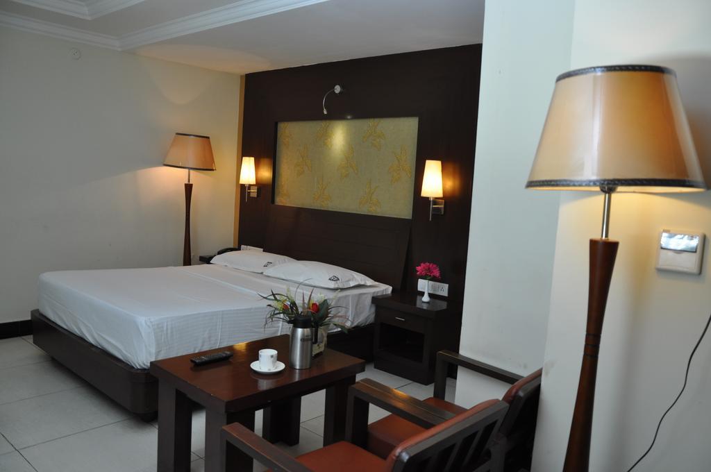 Hotel Shaans Tiruchirappalli Rom bilde