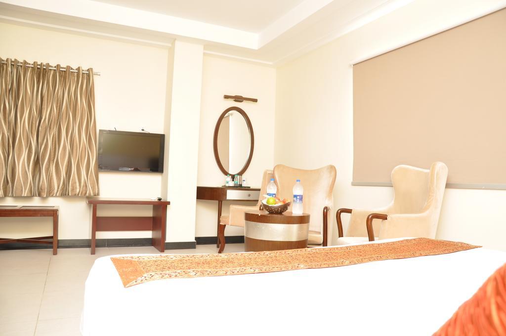 Hotel Shaans Tiruchirappalli Rom bilde